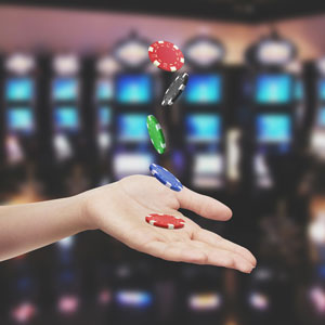 Hands with dice-health of employees of guest are important.