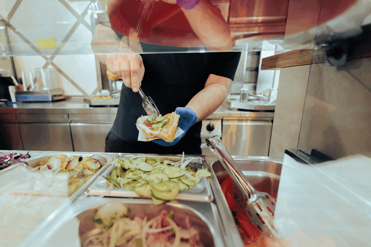 ,aking a sandwich at the deli 2026 )Feat Image for FSU page)