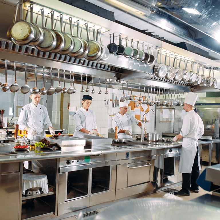 chefs standing in back of house foodservice kitchen - HACCP and Process HACCP: What It Takes for Food Manufacturers and Restaurant Brands to Ensure Food Safety